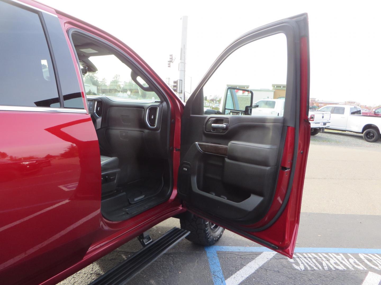 2021 MAROON /BLACK GMC Sierra 3500HD Denali (1GT49WEY1MF) with an Duramax 6.6L Turbo Diesel engine, 10 speed transmission, located at 2630 Grass Valley Highway, Auburn, CA, 95603, (530) 508-5100, 38.937893, -121.095482 - Duramax sitting on a BDS level kit with upper control arms and Fox shocks, 20" XD wheels, and 35" Nitto Ridge Grappler tires. - Photo#46